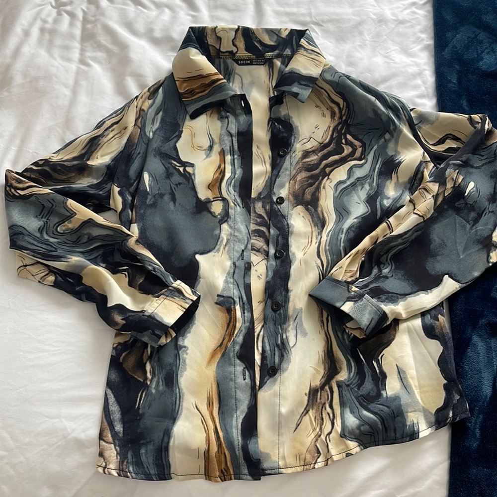 BRAND NEW! Size small blouse. Beautiful design